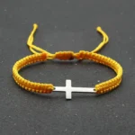 Bracelet tressé jaune avec croix en acier inoxydable